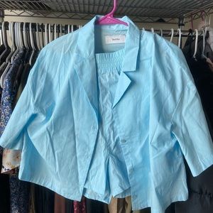 Light blue button shirt. Lightweight. Never worn (final sale item).